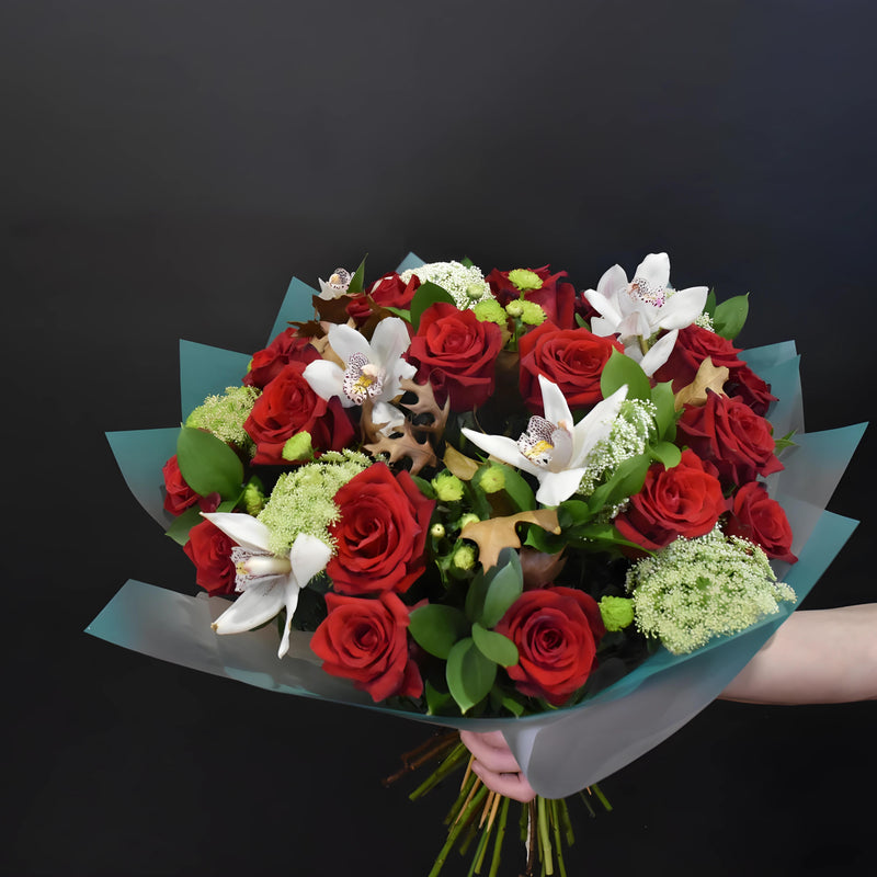 Special bouquet of red roses and cymbidium