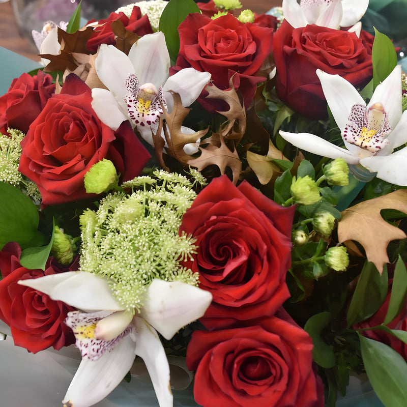Special bouquet of red roses and cymbidium
