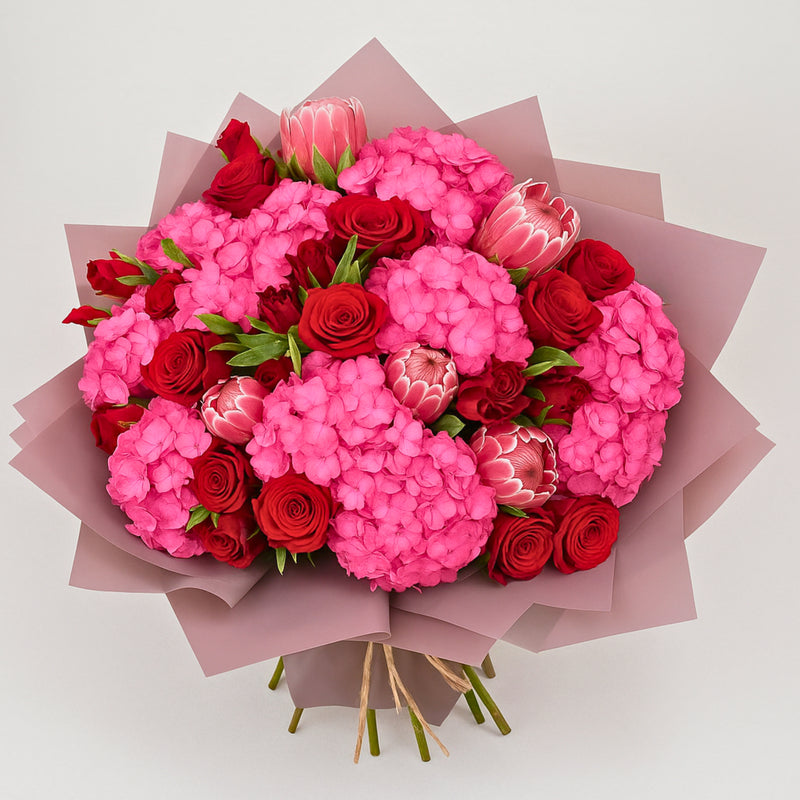 Luxurious Bouquet of Pink Hydrangea and Red Roses