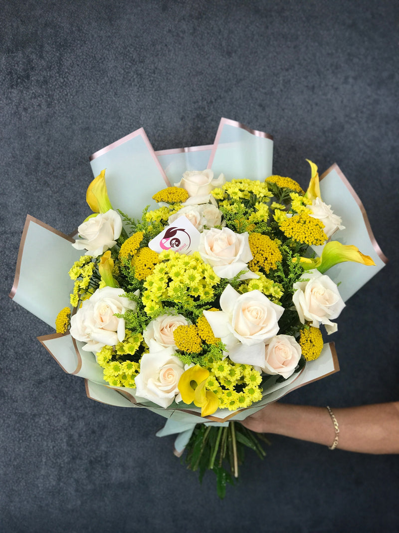 bouquet of white roses and mixed flowers