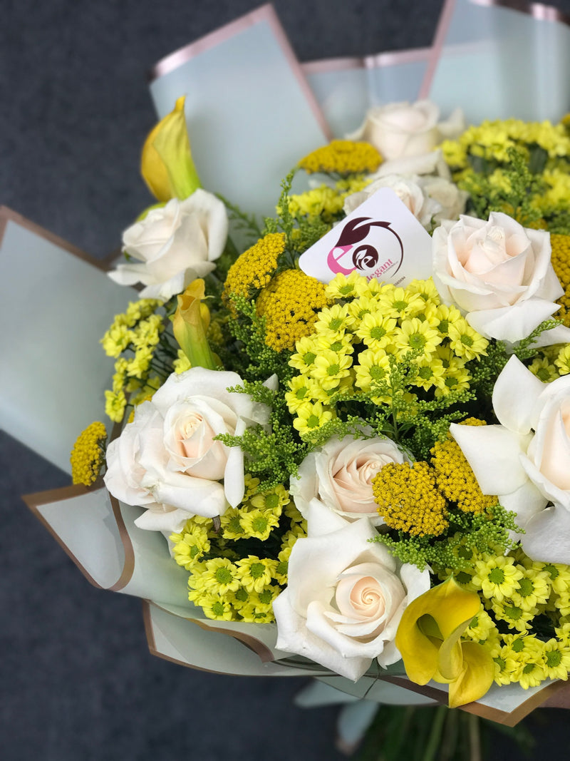 bouquet of white roses and mixed flowers